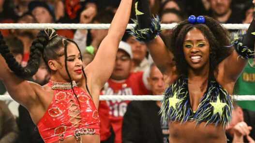 Naomi scores a pin to retain the WWE Womens Titles