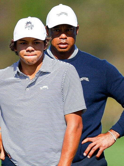 Tiger Woods and his son Charlie share the lead for