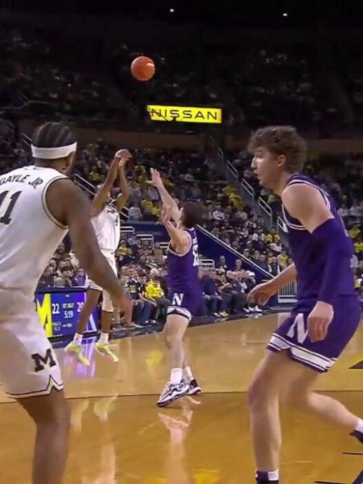 Michigans Nimari Burnett SPLASHES 3 pointer to extend Northwestern lead