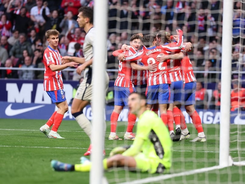 Relentless Atletico Madrid take La Liga lead with win over