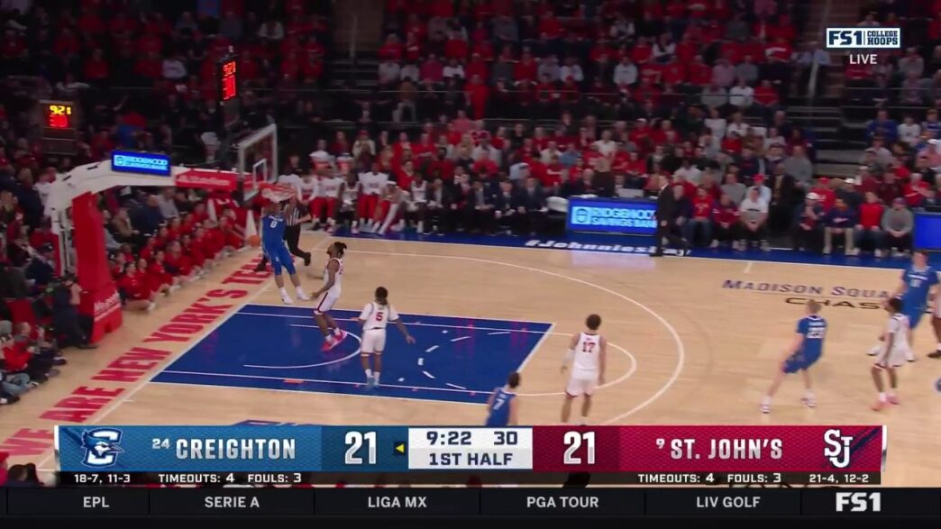 Jasen Green de Creighton slams a dunk taking the lead