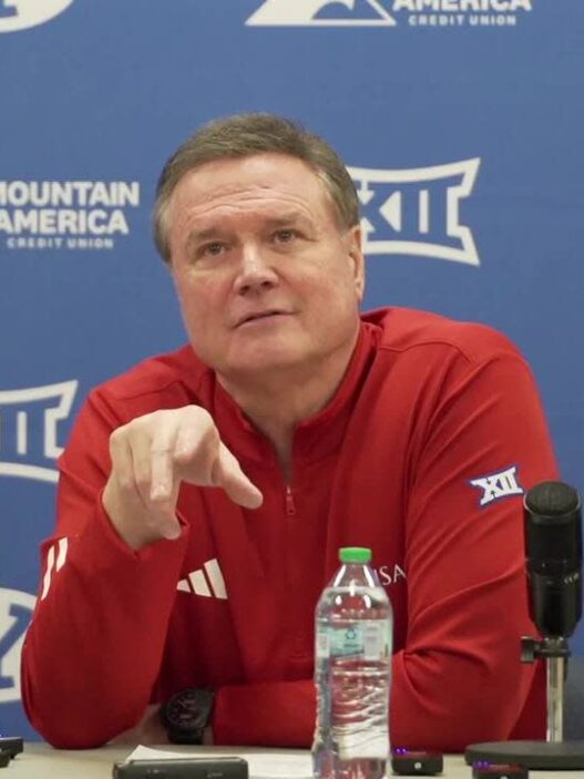 Kansas basketball coach Bill reacts to the loss of road