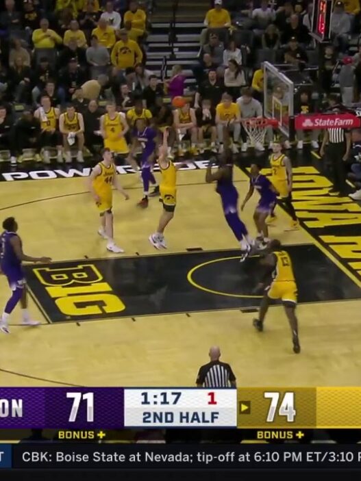 Payton Sandfort flows a clutch floater helping Iowa to defeat