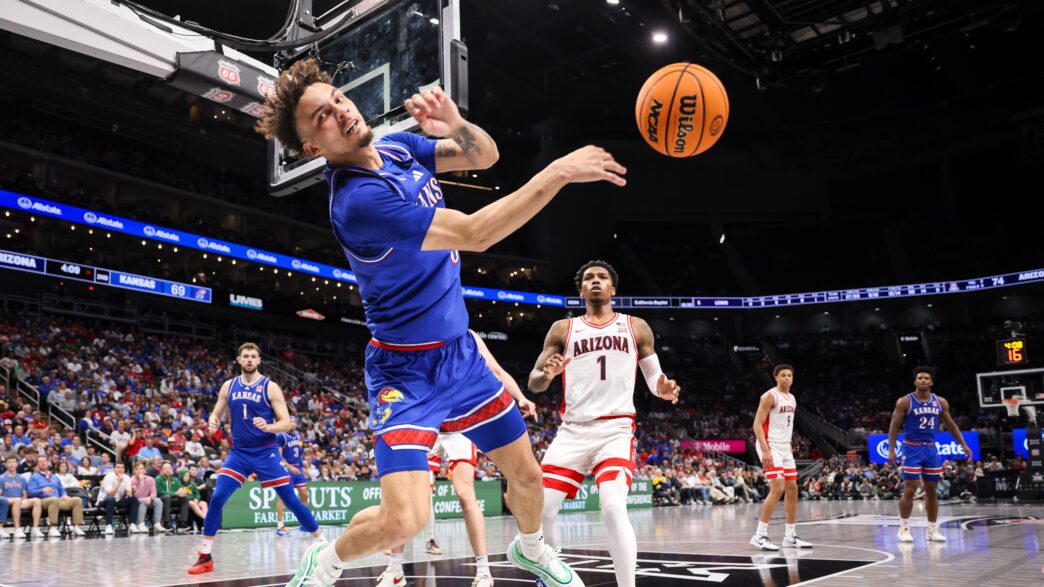 The Jayhawks react to the defeat of Kansas Basketball against